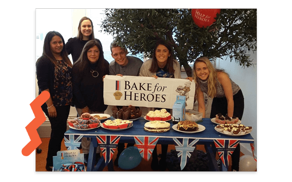 Harvest team presenting their cakes for Bake for Hereos charity event