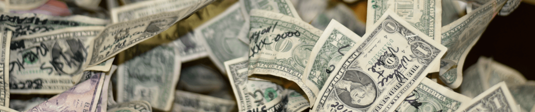 A pot of dollar notes